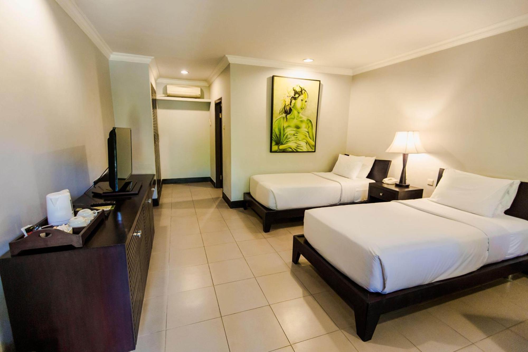 Puri Santrian Beach Resort And Spa Санур Экстерьер фото