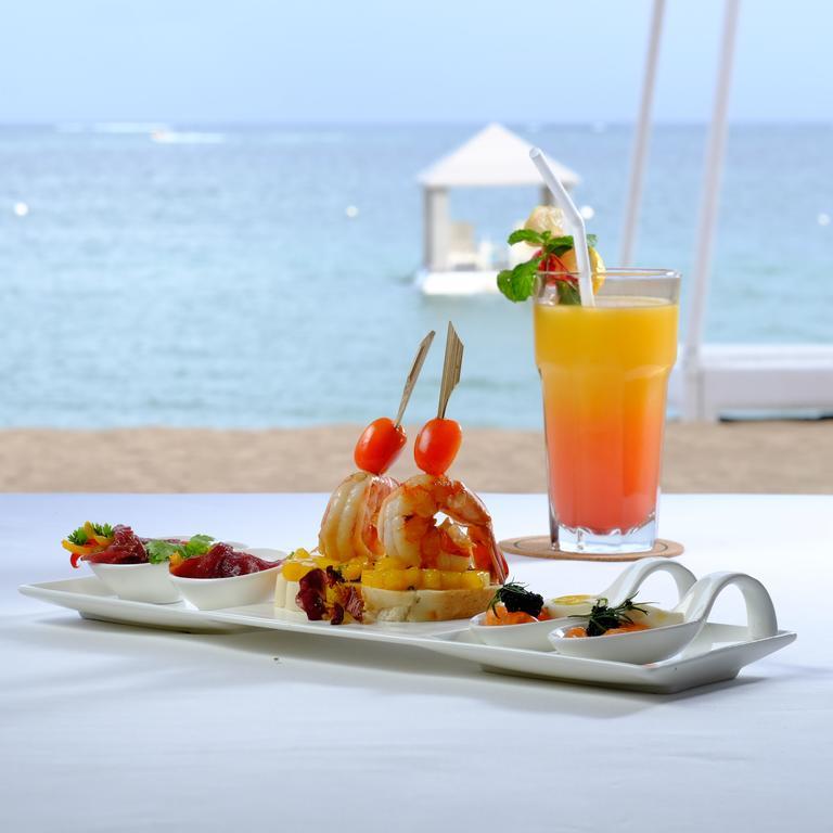 Puri Santrian Beach Resort And Spa Санур Экстерьер фото