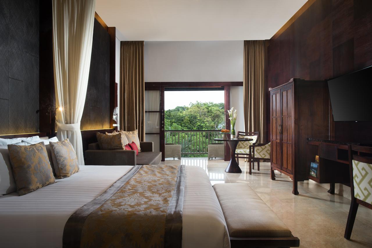 Puri Santrian Beach Resort And Spa Санур Экстерьер фото